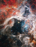 Colorful cosmic nebula with a bright star at the center.